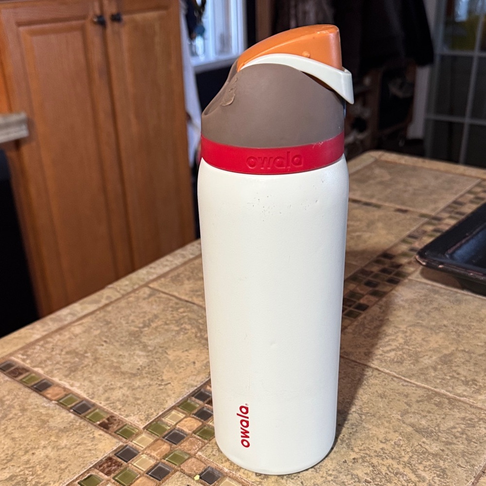 Owala White and Orange Water Bottle